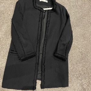 Black boucle car coat. Worn a few times.